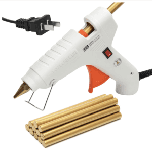 Hot glue gun with glue sticks and cord.